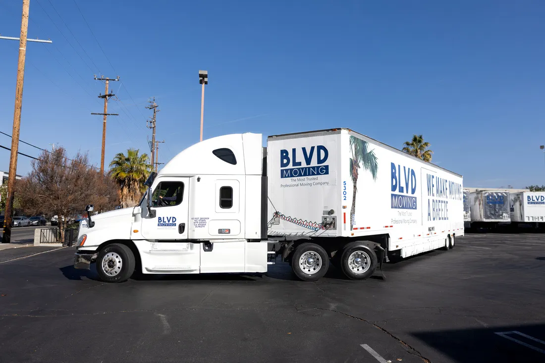 BLVD Moving tractor-trailer prepared for interstate transportation