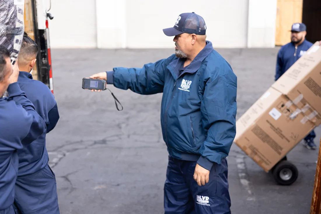 BLVD team member using an inventory scanner